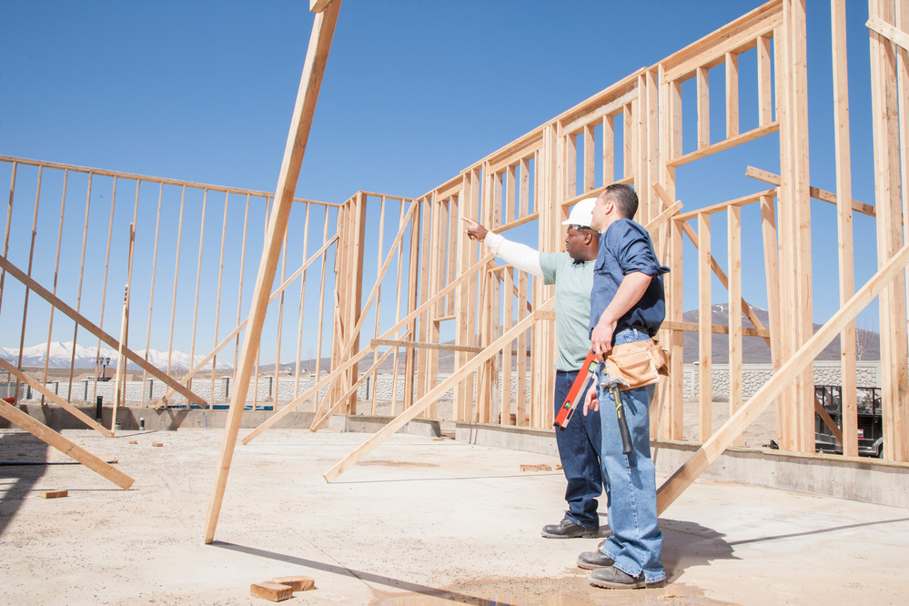 Builder constructing a home